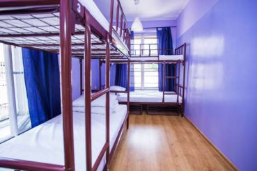 Bed in 6-Bed Dormitory Room with Shared Bathroom