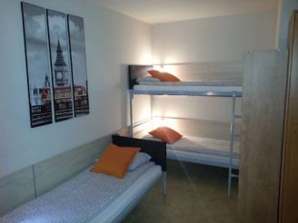 Single Bed in Dormitory Room